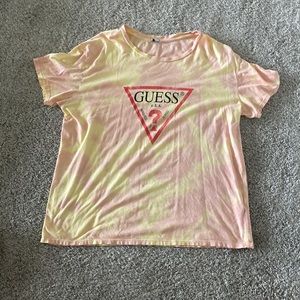 triangle logo on front, orange and yellow tie dye design, tee shirt